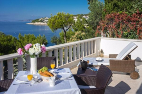 Luxury Beachfront Villa Primosten Oasis with private pool at the beach in Primosten